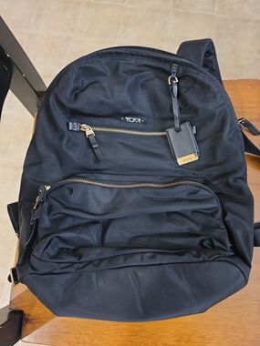 Tumi Black Nylon Backpack with Front Zip Pocket